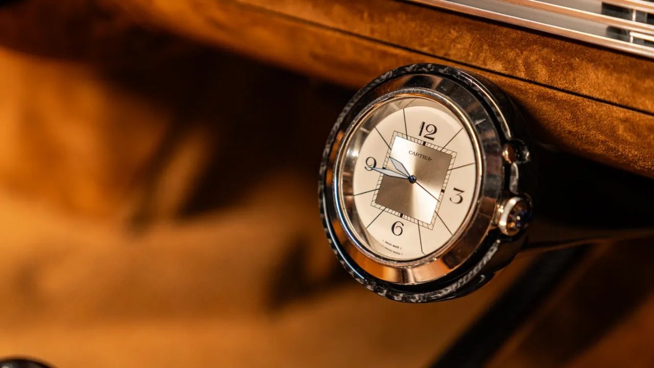 Cartier Pasha clock set into the Tesoro dashboard