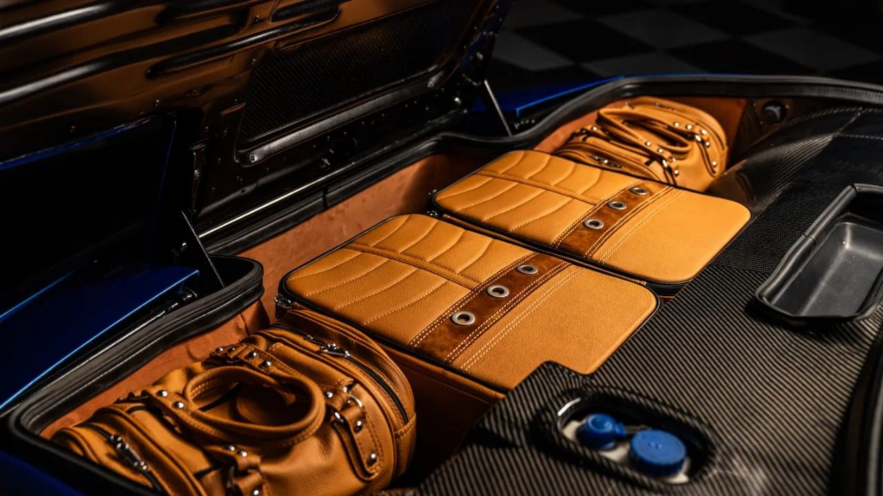 Set of tan fitted leather luggage in the Tesoro