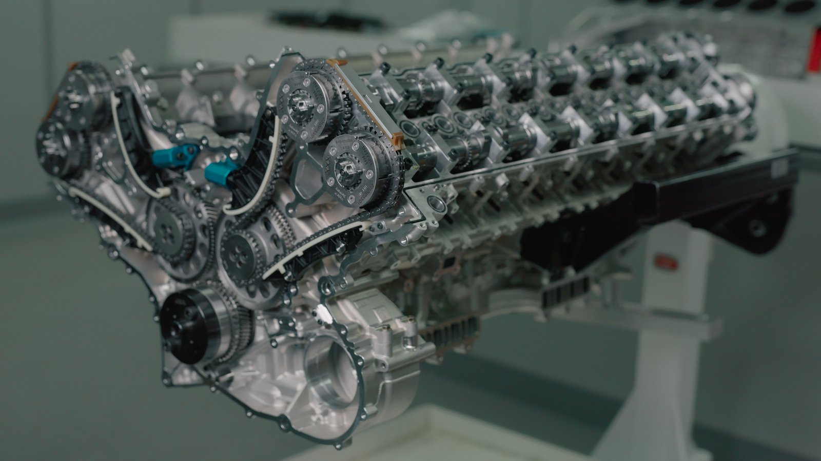The Bugatti Tourbillon's 8.3-liter naturally aspirated V16 engine on a display stand